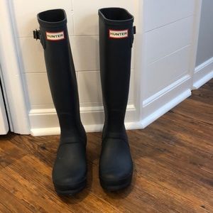 Navy blue hunter boots.